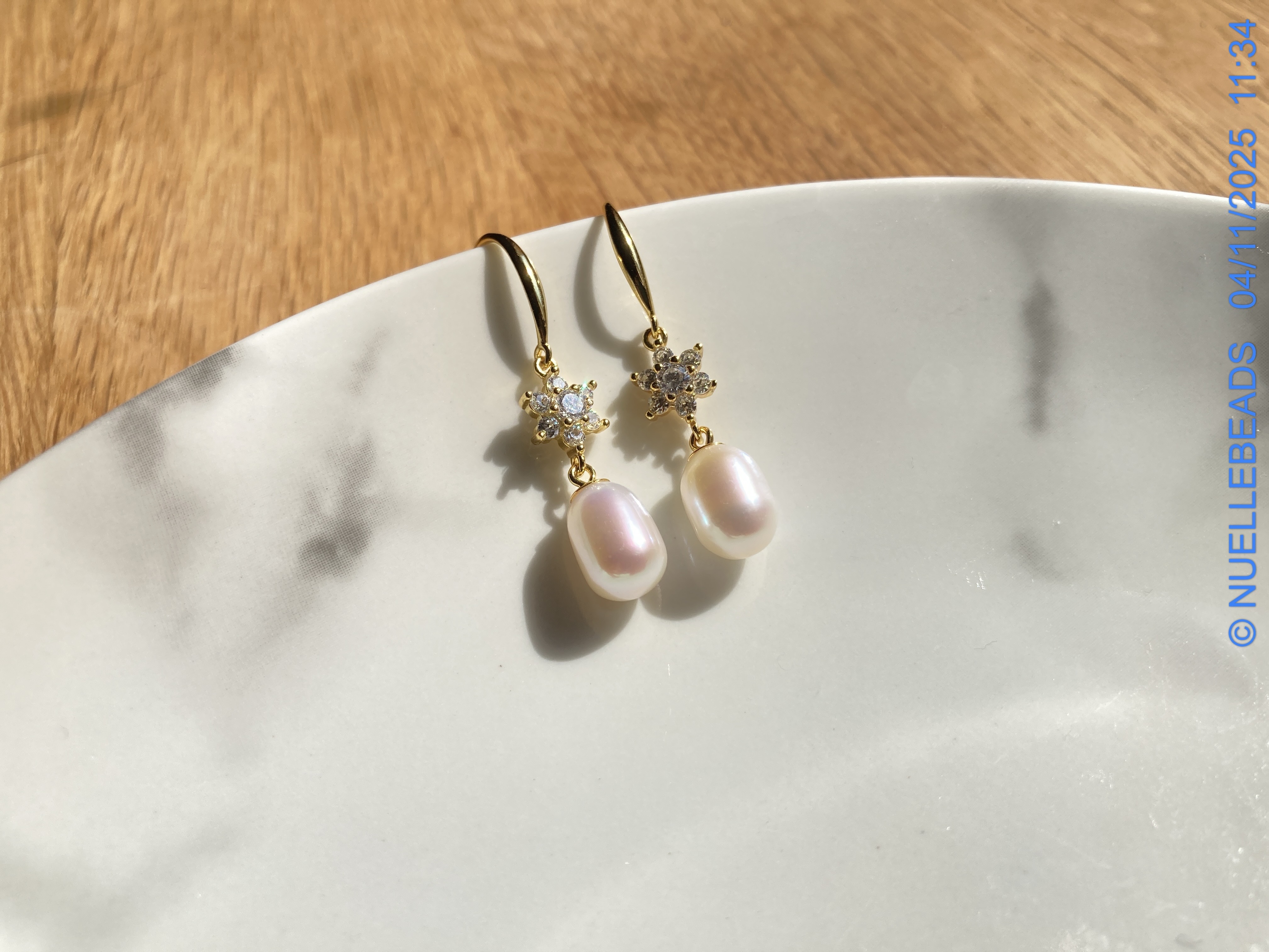 Drop pearl dangles with cz accents