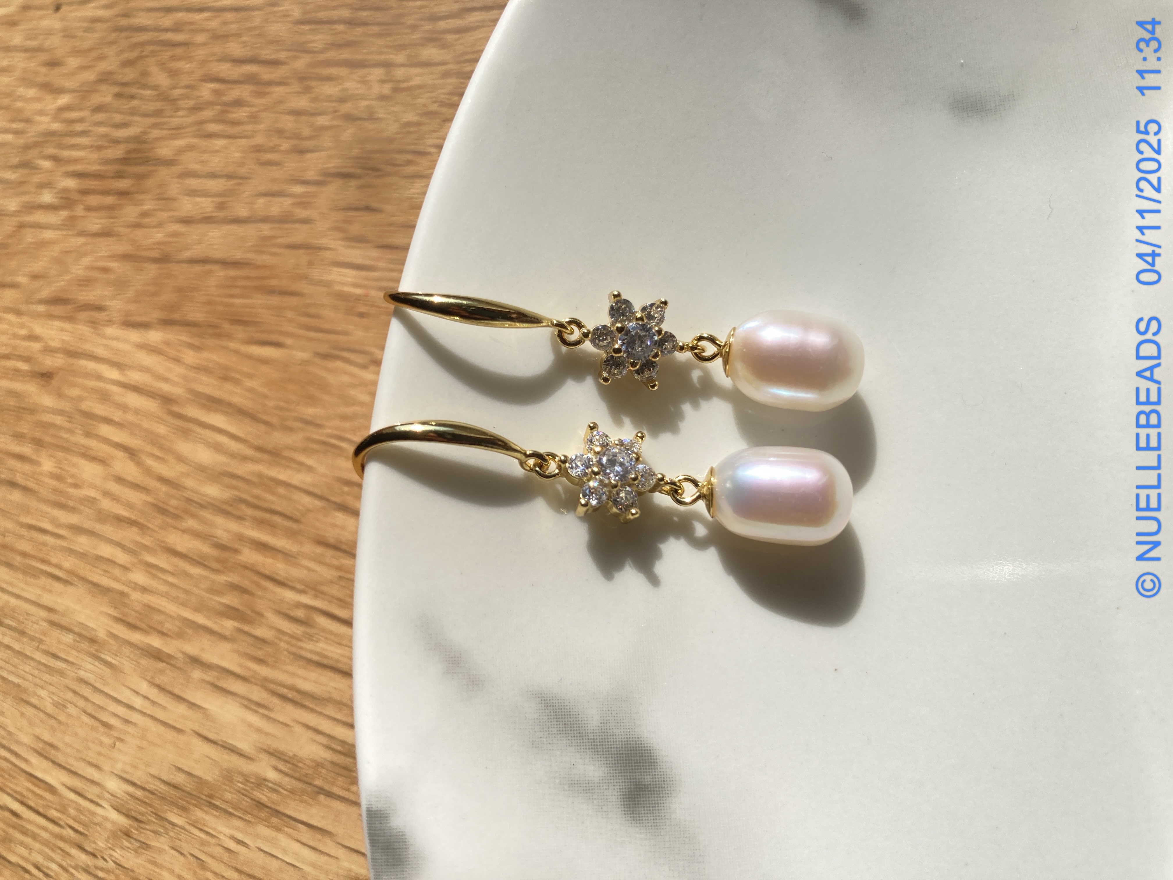 Drop pearl dangles with cz accents