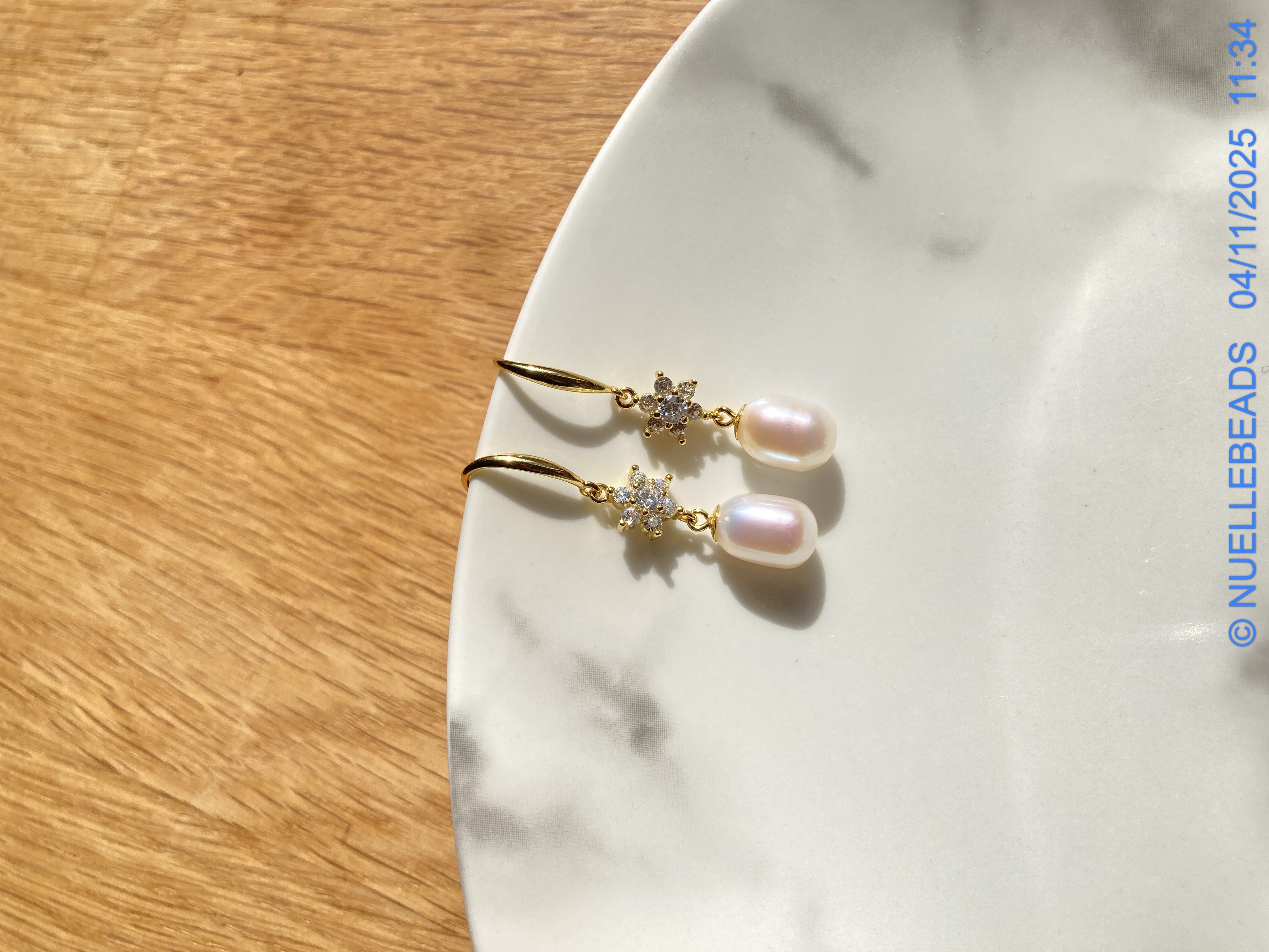 Drop pearl dangles with cz accents